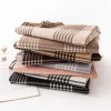 The winter thickened 2025 new style of Checkered children's versatile tassel fashionable and warm scarf is a comfortable faux cashmere scarf Application Scenario